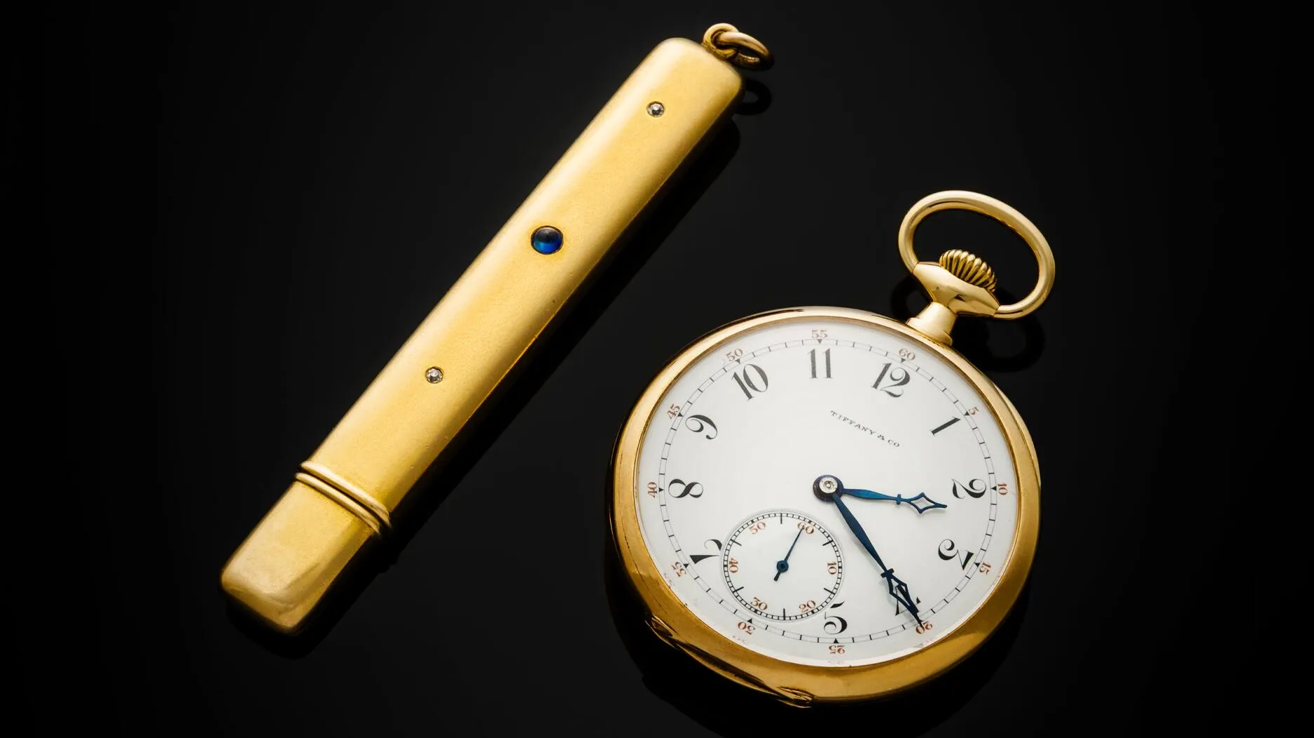 Аукцион золотых аксессуаров Джона А...